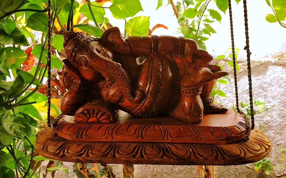 Communication And Sustainable Tourism - Wooden carving of Ganesha