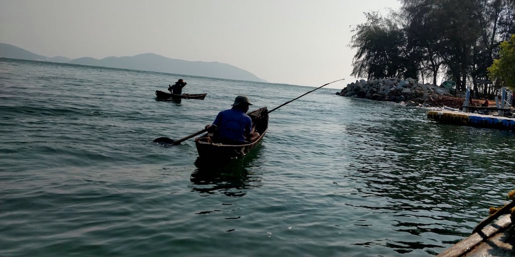 Fishermen at sea near Devbagh beach resort
