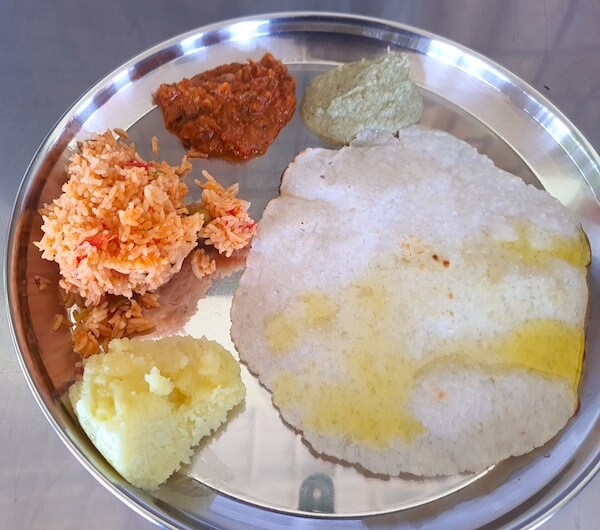Akki Rotti with ghee, Tomato Bhath, Kesari Bhath and chutneys