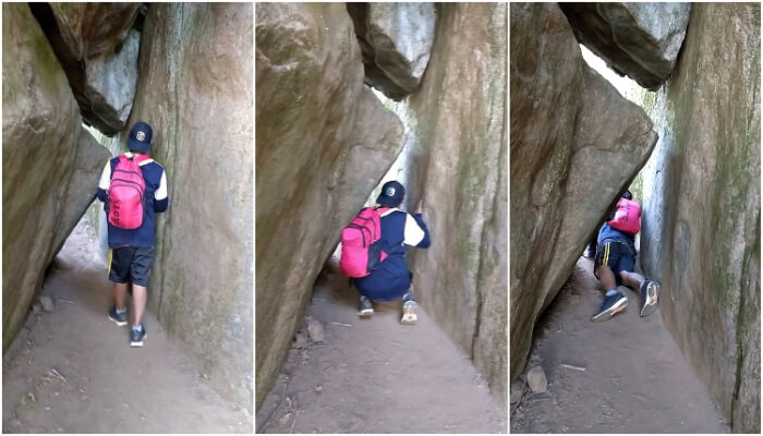 Squeeze through the rocks to rreach Shiva Cave Temple in Gavi Betta Sakleshpur